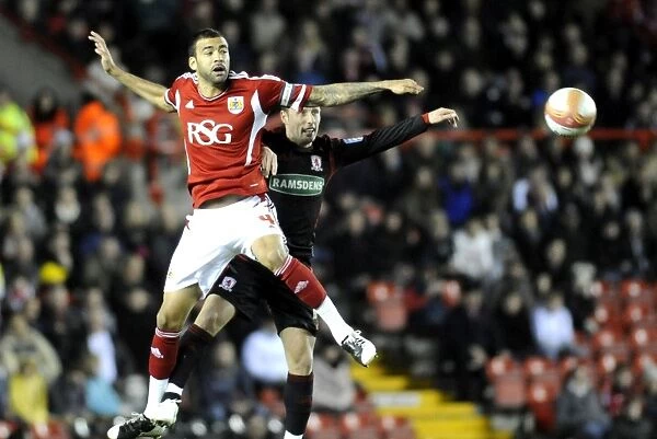 Bristol City vs. Middlesbrough: Aerial Clash Between Liam Fontaine and Scott McDonald