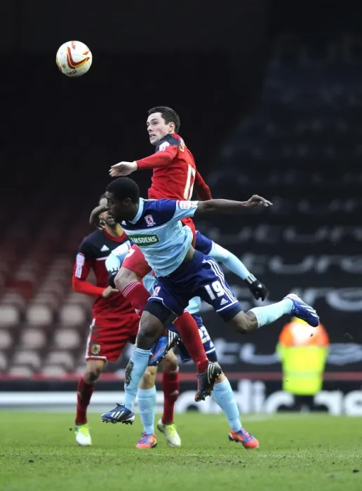 Framed Print : Bristol City vs Middlesbrough: Intense Aerial Battle Between Greg Cunningham and Mustapha Carayol Framed Print : Bristol City vs Middlesbrough: Intense Aerial Battle Between Greg Cunningham and Mustapha Carayol
