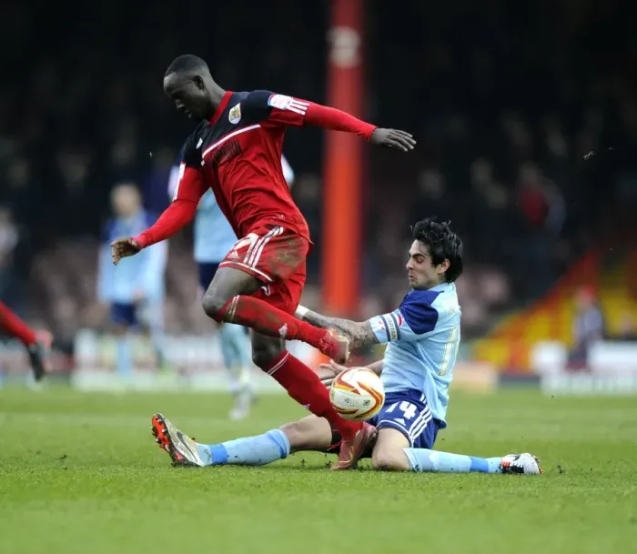 Framed Print : Bristol City vs Middlesbrough: Intense Moment as Rhys Williams Tackles Albert Adomah Framed Print : Bristol City vs Middlesbrough: Intense Moment as Rhys Williams Tackles Albert Adomah