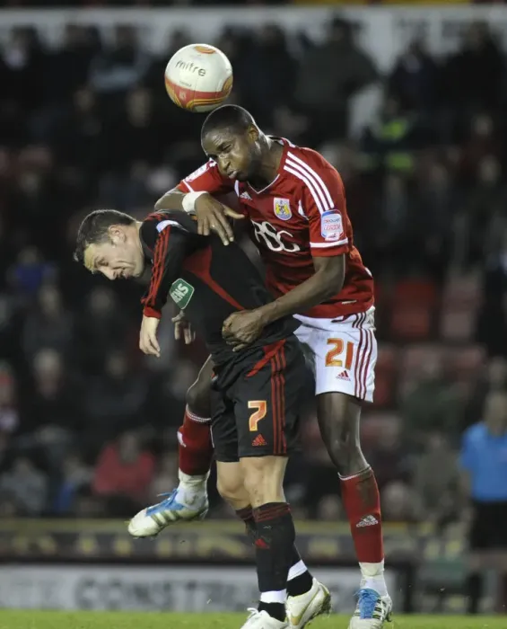 Framed Print : Bristol City vs Middlesbrough: Kalifa Cisse Challenges Scott McDonald - Neil Phillips / Pinnacle, 03 / 12 / 2011