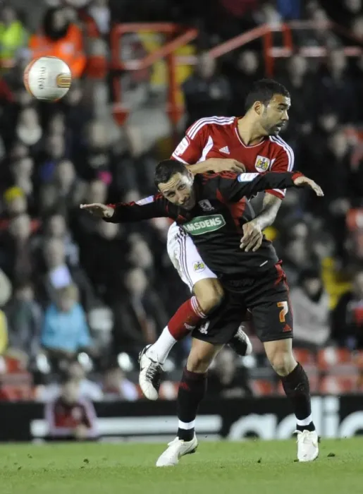 Framed Print : Bristol City vs. Middlesbrough: Liam Fontaine vs. Scott McDonald in Aerial Battle - Neil Phillips / Pinnacle, 03 / 12 / 2011 Framed Print : Bristol City vs. Middlesbrough: Liam Fontaine vs. Scott McDonald in Aerial Battle - Neil Phillips / Pinnacle, 03 / 12 / 2011