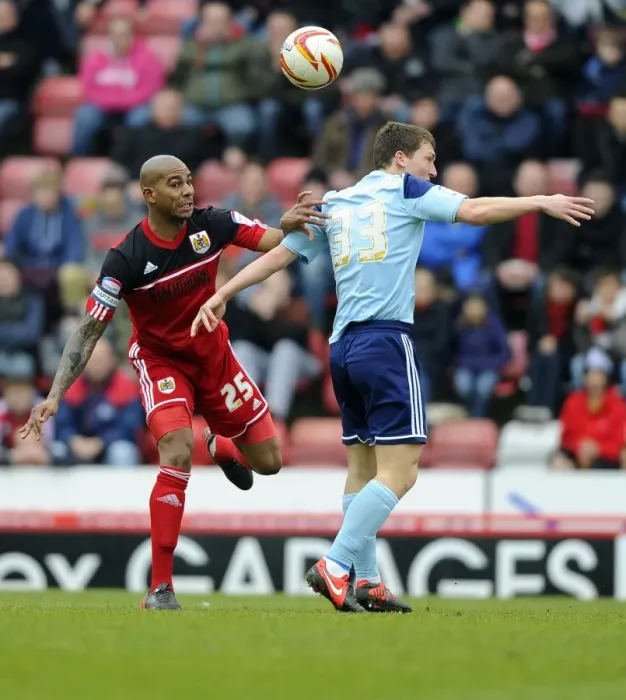 Framed Print : Bristol City vs Middlesbrough: Marvin Elliott vs Richard Smallwood - Intense Battle for the High Ball Framed Print : Bristol City vs Middlesbrough: Marvin Elliott vs Richard Smallwood - Intense Battle for the High Ball