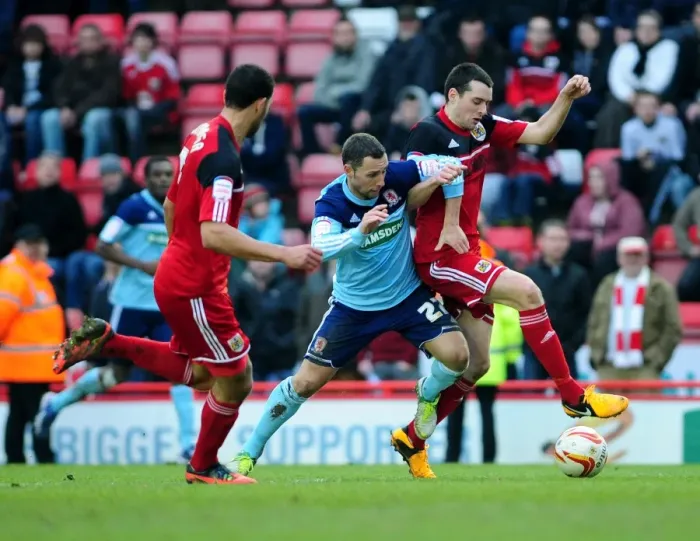 Framed Print : Bristol City vs. Middlesbrough: Tense Moment as Brendan Maloney Faces Off Against Scott McDonald Framed Print : Bristol City vs. Middlesbrough: Tense Moment as Brendan Maloney Faces Off Against Scott McDonald