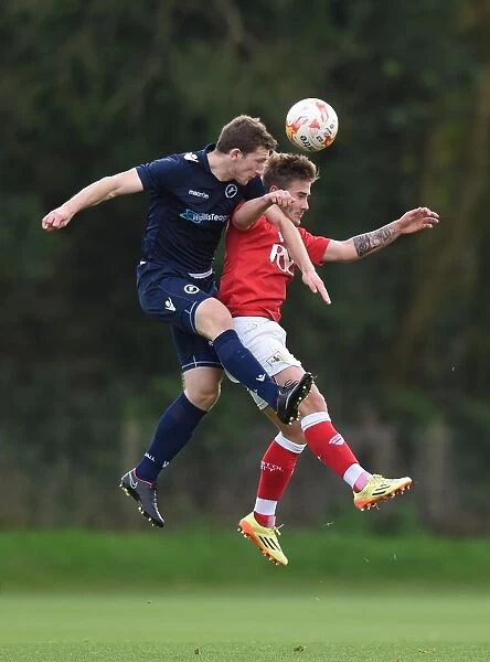 Bristol City vs Millwall: Intense Aerial Battle between Ben Withey and Keaton Wood
