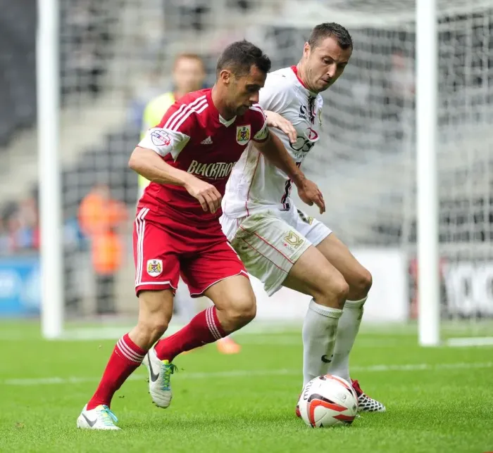 Framed Print : Bristol City vs Milton Keynes Dons: Intense Battle for Possession - Sam Baldock vs Antony Kay Framed Print : Bristol City vs Milton Keynes Dons: Intense Battle for Possession - Sam Baldock vs Antony Kay