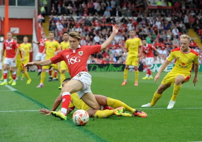 Framed Print : Bristol City vs MK Dons: Intense Moment as Carruthers Tackles Freeman Framed Print : Bristol City vs MK Dons: Intense Moment as Carruthers Tackles Freeman