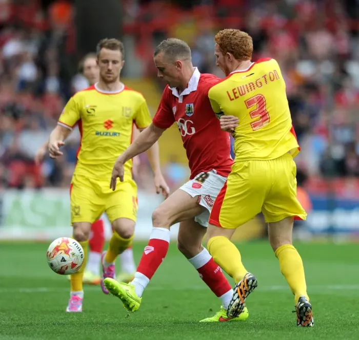 Framed Print : Bristol City vs MK Dons: Wilbraham Holds Off Lewington Framed Print : Bristol City vs MK Dons: Wilbraham Holds Off Lewington