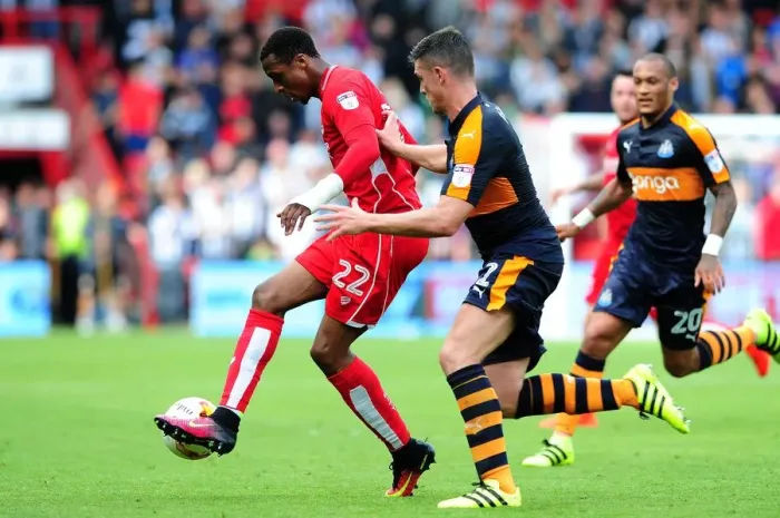 Framed Print : Bristol City vs Newcastle United: Kodjia Thwarted by Defender
