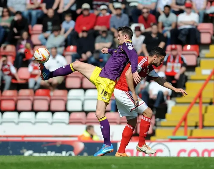 Framed Print : Bristol City vs Notts County: Intense Moment between Derrick Williams and James Spencer