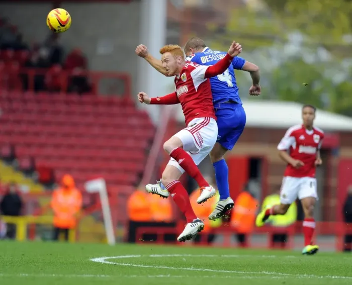 Framed Print : Bristol City vs Oldham Athletic: Intense Aerial Battle Between Ryan Taylor and James Wesolowski Framed Print : Bristol City vs Oldham Athletic: Intense Aerial Battle Between Ryan Taylor and James Wesolowski