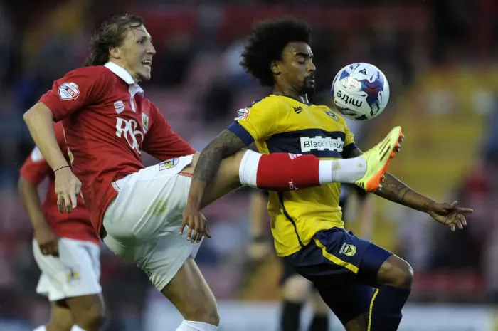 Framed Print : Bristol City vs Oxford United: Luke Ayling Tackles Junior Brown in First Round Capital One Cup Clash Framed Print : Bristol City vs Oxford United: Luke Ayling Tackles Junior Brown in First Round Capital One Cup Clash