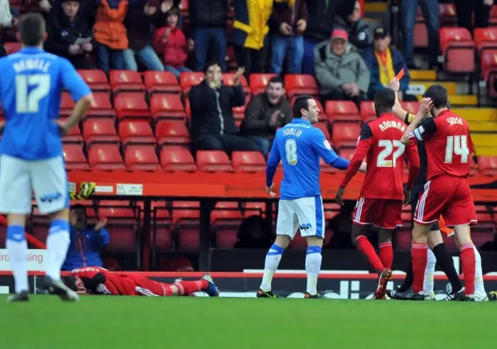 Framed Print : Bristol City vs Peterborough: Lee Tomlin's Red Card for Foul on Greg Cunningham (Championship Football) Framed Print : Bristol City vs Peterborough: Lee Tomlin's Red Card for Foul on Greg Cunningham (Championship Football)