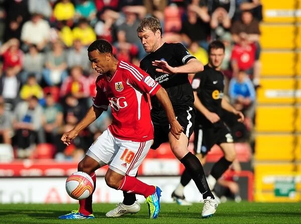 Bristol City vs. Peterborough United: Maynard vs. McCann - Battle for Possession in October 2011 Championship Clash