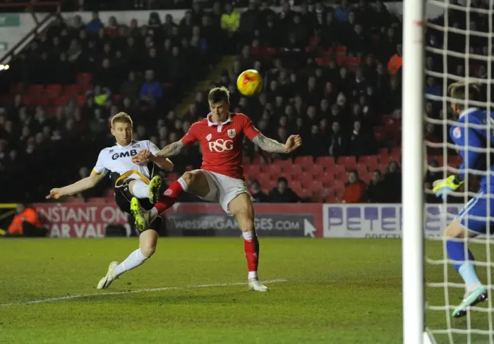 Framed Print : Bristol City vs Port Vale: Aden Flint vs Chris Robertson - Intense Battle on the Pitch Framed Print : Bristol City vs Port Vale: Aden Flint vs Chris Robertson - Intense Battle on the Pitch
