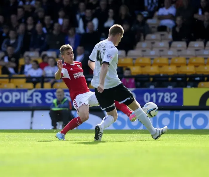 Framed Print : Bristol City vs Port Vale: Joe Bryan Closes In on Chris Robertson Framed Print : Bristol City vs Port Vale: Joe Bryan Closes In on Chris Robertson
