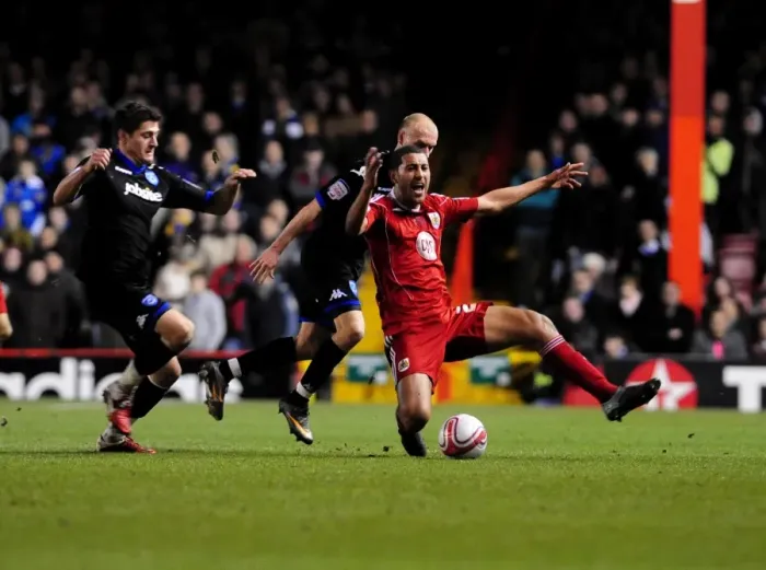 Framed Print : Bristol City vs Portsmouth: Lewin Nyatanga Fouled by David Cotterill - Championship Clash at Ashton Gate Stadium (08 / 03 / 2011) Framed Print : Bristol City vs Portsmouth: Lewin Nyatanga Fouled by David Cotterill - Championship Clash at Ashton Gate Stadium (08 / 03 / 2011)