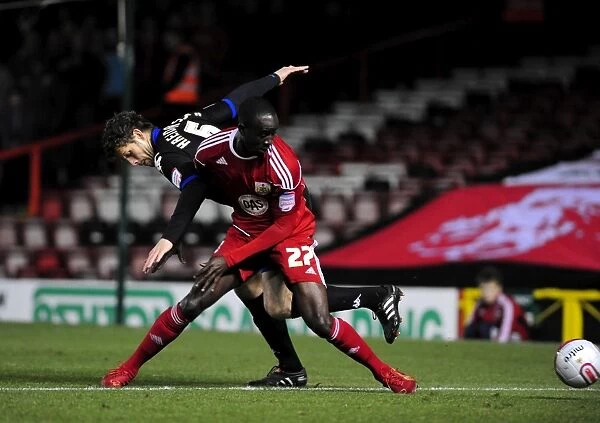 Bristol City vs Portsmouth: Albert Adomah vs Hermann Hreidarsson Battle in Championship Match, 08 / 03 / 2011