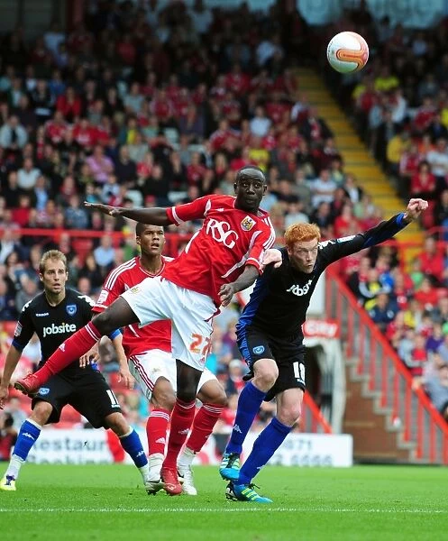 Bristol City vs Portsmouth: Albert Adomah vs Dave Kitson Battle in Championship Match, 2008-11