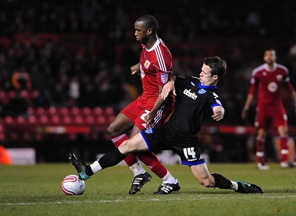 Bristol City vs Portsmouth: Intense Battle Between Kalifa Cisse and Jonathan Hogg in Championship Match, 8th March 2011