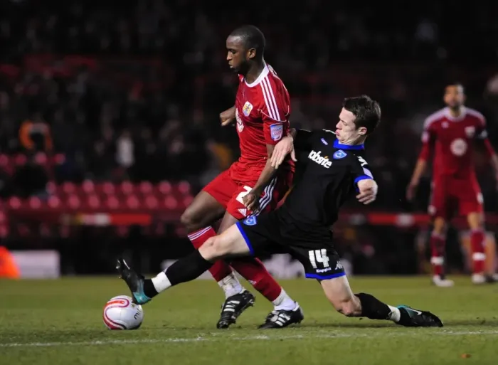 Framed Print : Bristol City vs Portsmouth: Intense Battle Between Kalifa Cisse and Jonathan Hogg in Championship Match, 8th March 2011 Framed Print : Bristol City vs Portsmouth: Intense Battle Between Kalifa Cisse and Jonathan Hogg in Championship Match, 8th March 2011