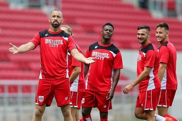 Bristol City vs Portsmouth: Intense Moment between Aaron Wilbraham and Unnamed Portsmouth Player at Ashton Gate Stadium (Pre-Season Friendly, 2016)