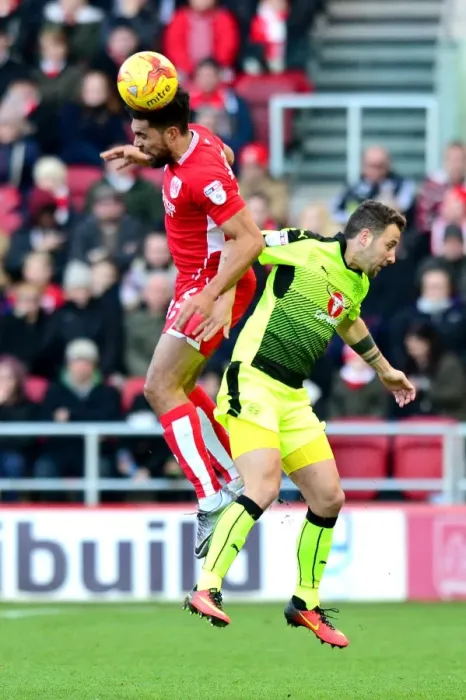 Framed Print : Bristol City vs Reading: Intense Aerial Battle Between Scott Golbourne and Roy Beerens Framed Print : Bristol City vs Reading: Intense Aerial Battle Between Scott Golbourne and Roy Beerens