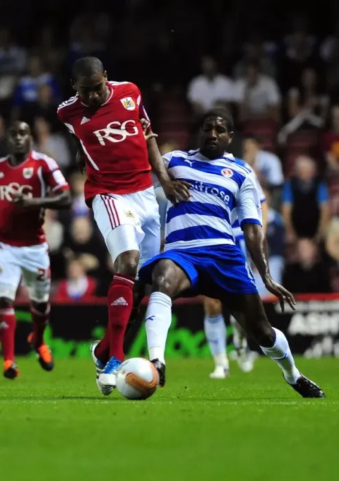 Framed Print : Bristol City vs. Reading: Marvin Elliott vs. Mikele Leigertwood Battle for Ball in Championship Match, September 2011 Framed Print : Bristol City vs. Reading: Marvin Elliott vs. Mikele Leigertwood Battle for Ball in Championship Match, September 2011