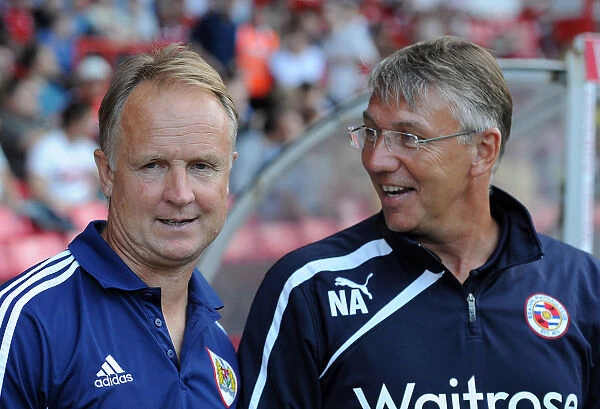 Bristol City vs. Reading: Nigel Adkins and Sean O'Driscoll Share a Light-Hearted Moment on the Touchline