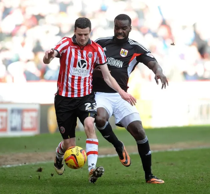Framed Print : Bristol City vs Sheffield United: Karleigh Osborne and Jamie Murphy Clash in League One Action Framed Print : Bristol City vs Sheffield United: Karleigh Osborne and Jamie Murphy Clash in League One Action