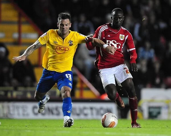 Bristol City vs Southampton: Albert Adomah vs Danny Fox Battle in Championship Match, 26th November 2011 - Editorial Use Only