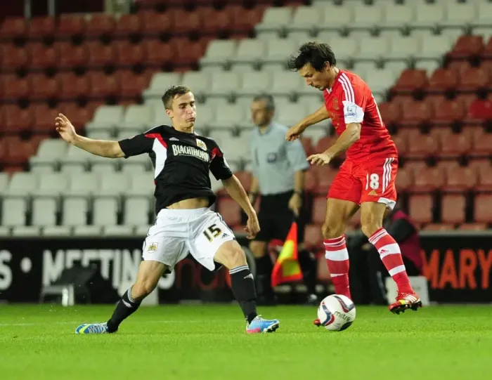 Framed Print : Bristol City vs Southampton: Joe Bryan Faces Off Against Jack Cork Framed Print : Bristol City vs Southampton: Joe Bryan Faces Off Against Jack Cork