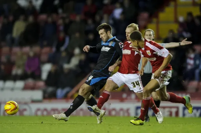 Framed Print : Bristol City vs Stevenage: Intense Midfield Battle Between Doughty and Gillett
