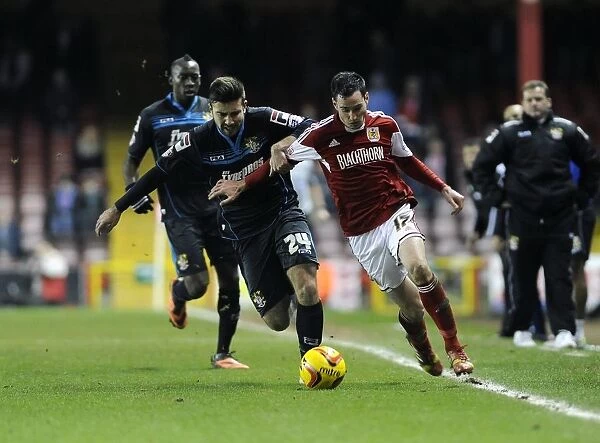 Bristol City vs Stevenage: Intense Moment as Greg Cunningham is Challenged by Michael Doughty