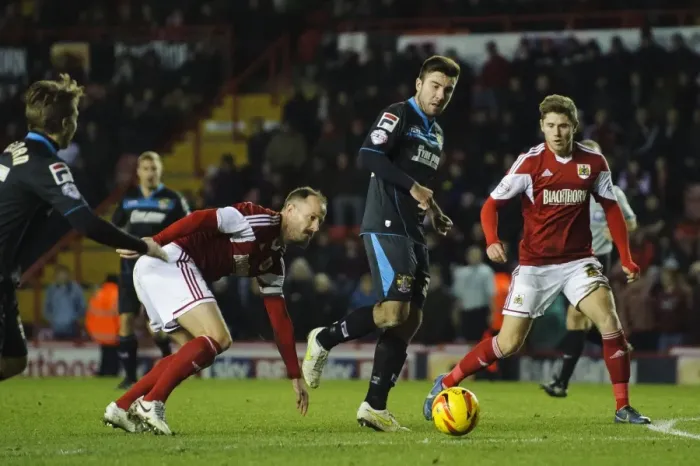 Framed Print : Bristol City vs Stevenage: Intense Moment as Louis Carey Faces Off Against Michael Doughty Framed Print : Bristol City vs Stevenage: Intense Moment as Louis Carey Faces Off Against Michael Doughty