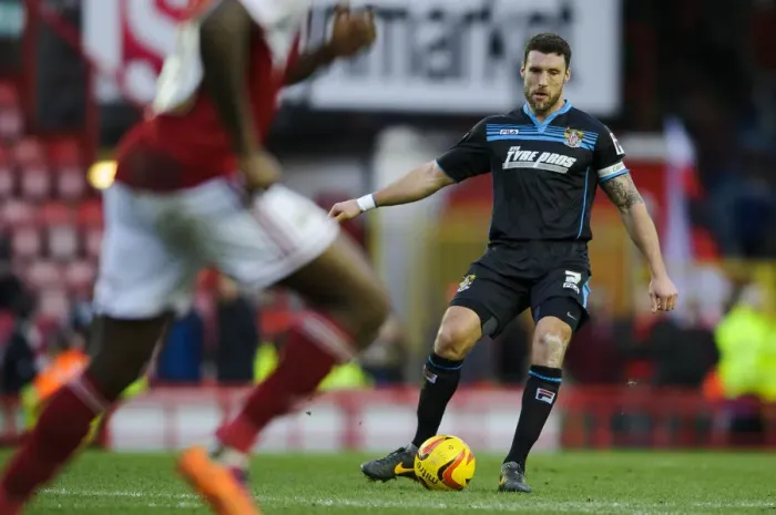 Framed Print : Bristol City vs Stevenage: Jon Ashton in Action during Sky Bet League One Clash at Ashton Gate