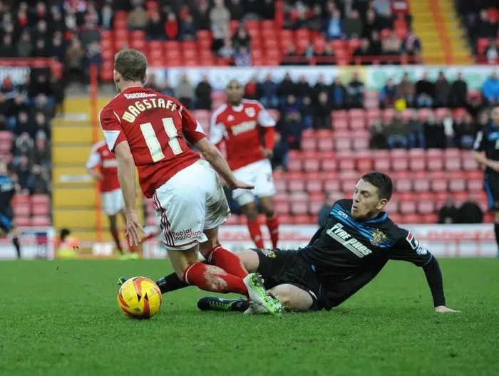Framed Print : Bristol City vs Stevenage: Wagstaff Tackled in Sky Bet League One Clash Framed Print : Bristol City vs Stevenage: Wagstaff Tackled in Sky Bet League One Clash