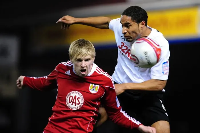 Framed Print : Bristol City vs Swansea City: Intense Battle between Andy Keogh and Ashley Williams - Championship Football Match, January 2011
