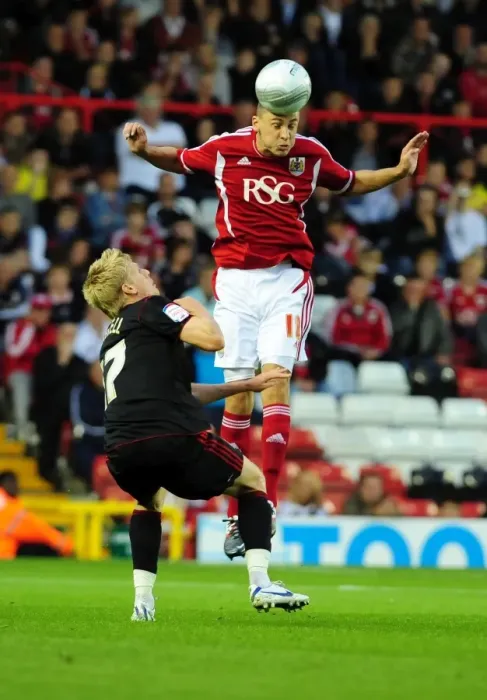Framed Print : Bristol City vs Swindon Town: James Wilson vs Alan Connell in Intense League Cup Clash at Ashton Gate Stadium (August 24, 2011) Framed Print : Bristol City vs Swindon Town: James Wilson vs Alan Connell in Intense League Cup Clash at Ashton Gate Stadium (August 24, 2011)
