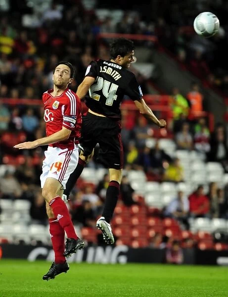 Bristol City vs Swindon Town: Cole Skuse vs Jonathan Smith Battle in 2011 League Cup Match