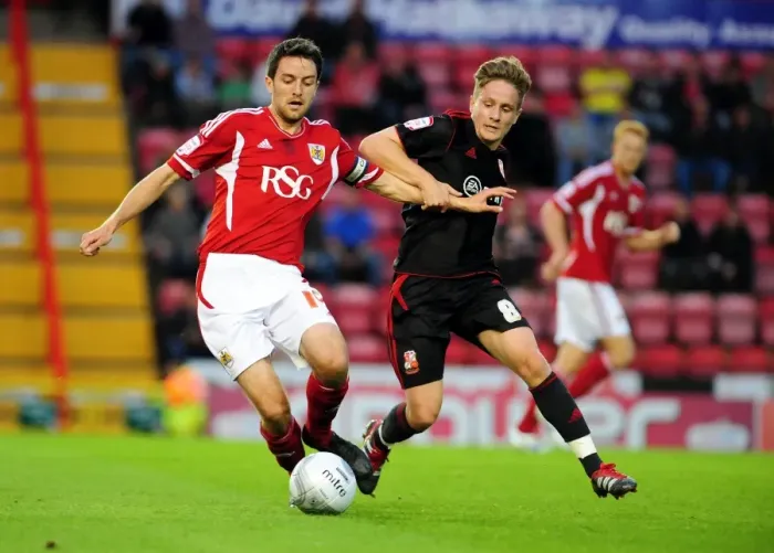Framed Print : Bristol City vs Swindon Town: Cole Skuse vs Simon Ferry Battle in League Cup Match, August 2011 - Football Framed Print : Bristol City vs Swindon Town: Cole Skuse vs Simon Ferry Battle in League Cup Match, August 2011 - Football