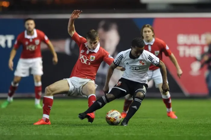 Framed Print : Bristol City vs Swindon Town: Joe Bryan and Nathan Byrne in Heated Battle for the Ball Framed Print : Bristol City vs Swindon Town: Joe Bryan and Nathan Byrne in Heated Battle for the Ball