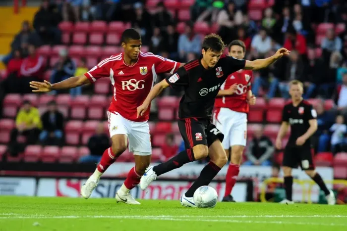 Framed Print : Bristol City vs Swindon Town: Jordan Spence vs Lander Gabilondo Battle in League Cup Match, August 2011