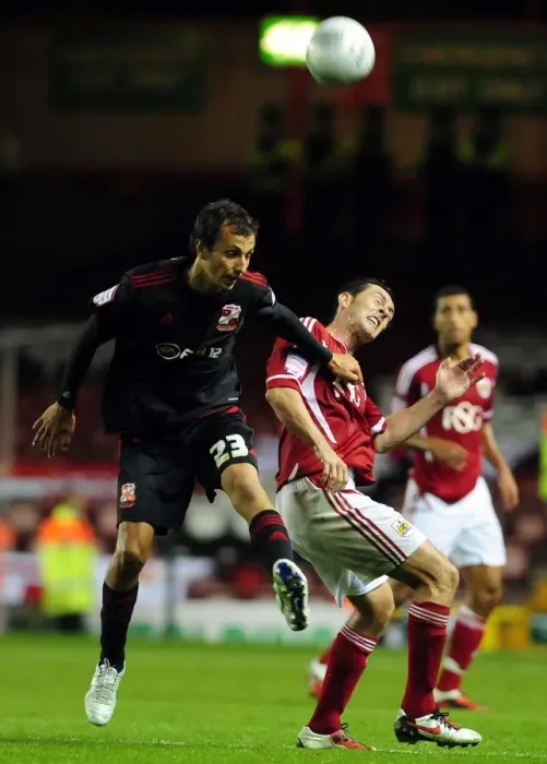 Framed Print : Bristol City vs Swindon Town: Raffaele De Vita vs Jamie McAllister Battle in the 2011 League Cup