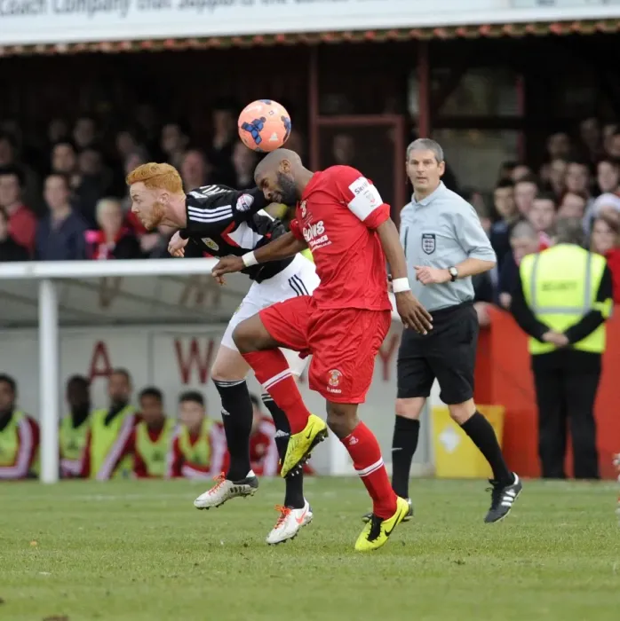 Framed Print : Bristol City vs Tamworth: Intense Aerial Battle Between Ryan Taylor and Wayne Thomas Framed Print : Bristol City vs Tamworth: Intense Aerial Battle Between Ryan Taylor and Wayne Thomas