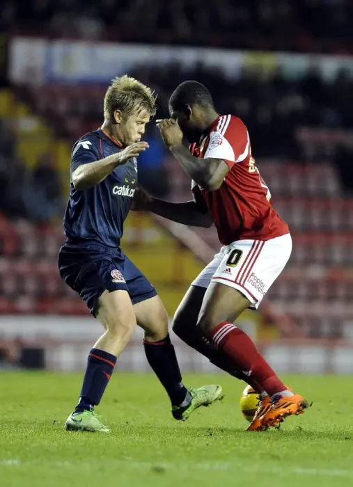Framed Print : Bristol City vs Walsall: Intense Moment as Jay Emmanuel-Thomas is Tackled by Sam Mantom Framed Print : Bristol City vs Walsall: Intense Moment as Jay Emmanuel-Thomas is Tackled by Sam Mantom