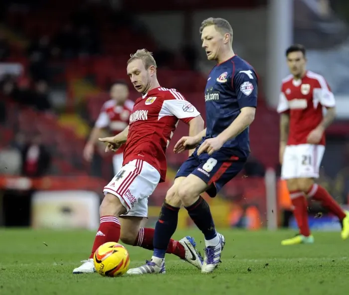 Framed Print : Bristol City vs Walsall: Intense Moment as Simon Gillett Faces Off Against Sam Mantom Framed Print : Bristol City vs Walsall: Intense Moment as Simon Gillett Faces Off Against Sam Mantom