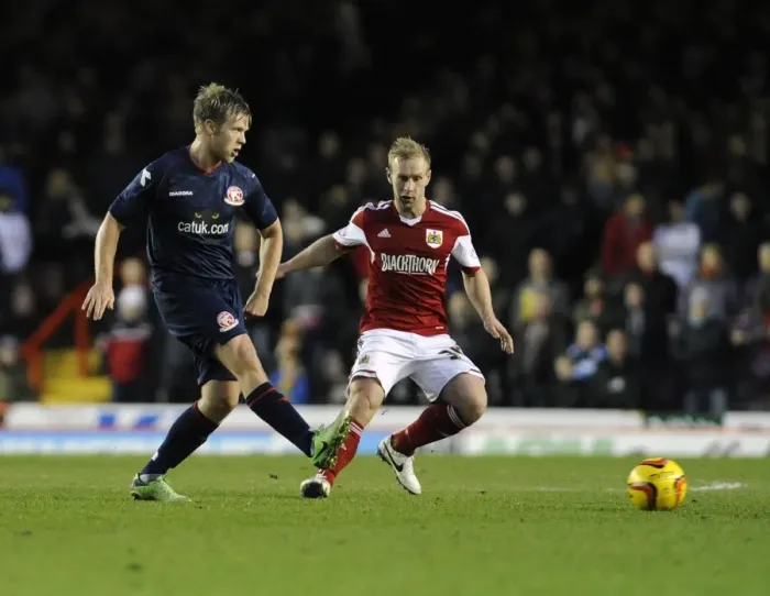 Framed Print : Bristol City vs Walsall: Simon Gillett's Determined Challenge Framed Print : Bristol City vs Walsall: Simon Gillett's Determined Challenge