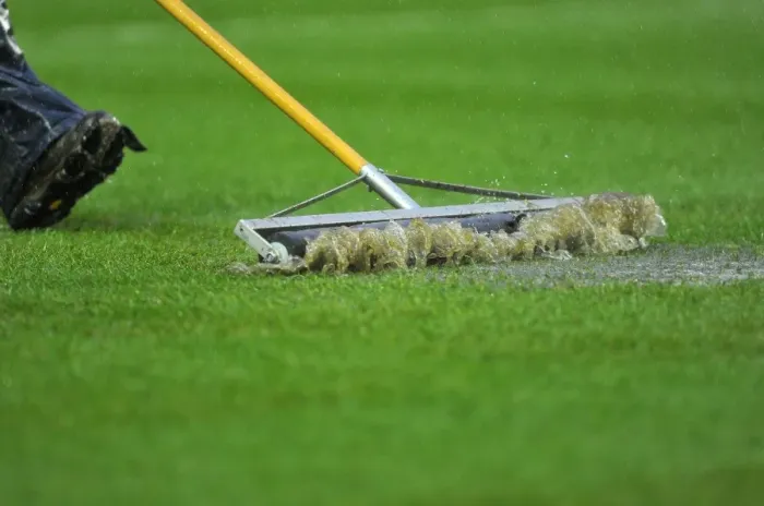 Framed Print : Bristol City vs. Watford: A Winter's Day Battle - Refree Calls Off Match Amidst Grounds Crew's Relentless Efforts