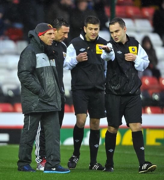 Bristol City vs. Watford: Derek McInnes and Gianfranco Zola Discuss with Referee Before Game's Postponement