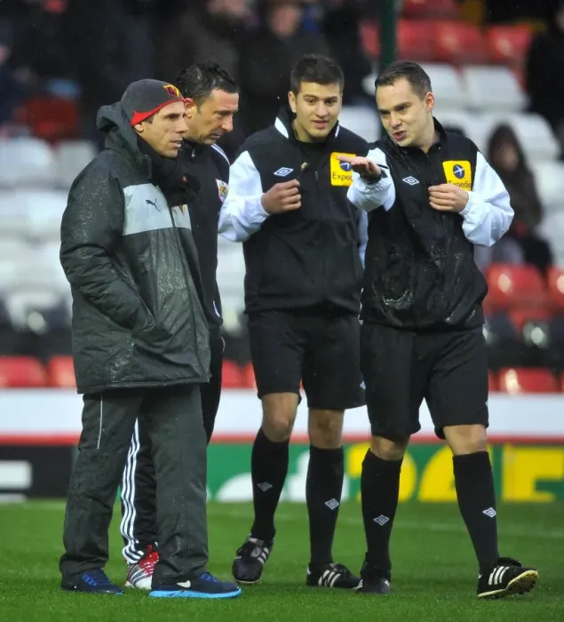 Framed Print : Bristol City vs. Watford: Derek McInnes and Gianfranco Zola Discuss with Referee Before Game's Postponement